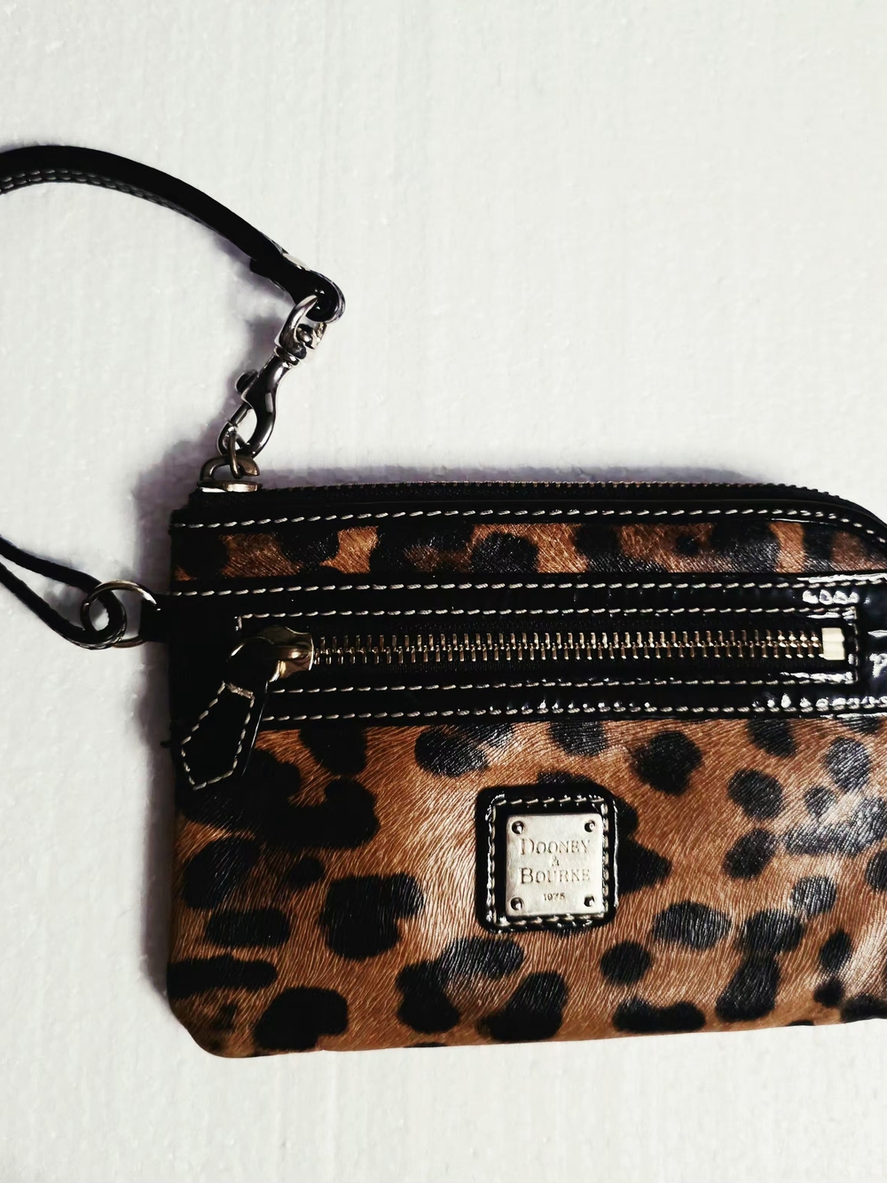 Dooney & Bourke All Weather Canvas Leopard Print Wristlet in Brown and Black